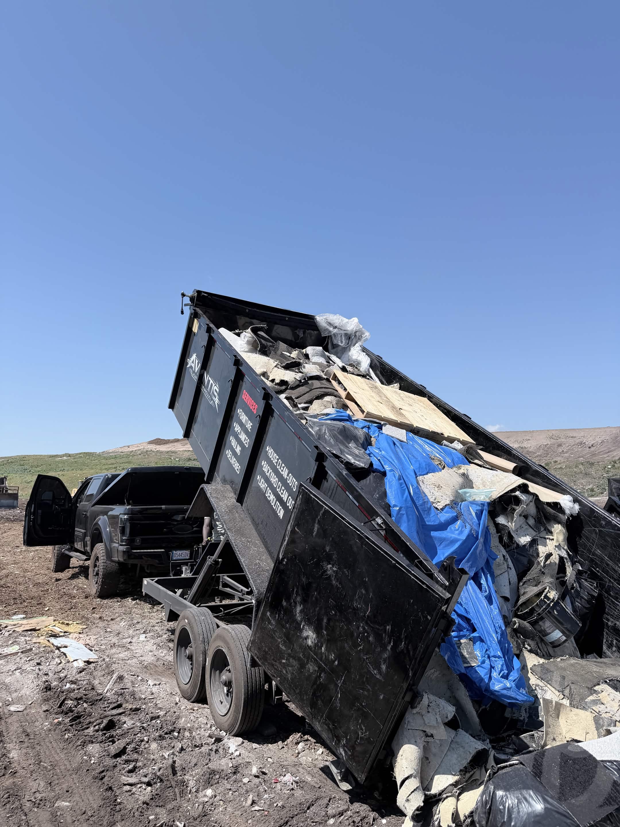 Aventis dump trailer unloading construction debris at a Central Florida landfill
